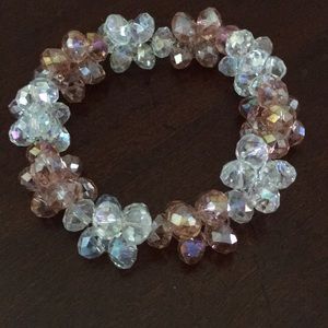 Crystal elastic bracket in white shimmering color.